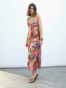 Maija Vestido de mujer con estampado floral colorido y parches, diseño casual y bohemio versátil para primavera/verano, apto para el Día de San Patricio, festivales de música, cruceros, y atuendos de la isla de Ibiza, con espalda ajustable con cruce.