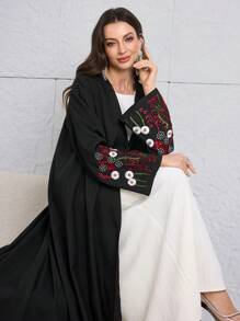 Al Najma 宽松优雅的阿拉伯风格阿巴亚长袍，袖口绣有水钻，正面纽扣设计，方便穿着 - 黑色 - 查看 1