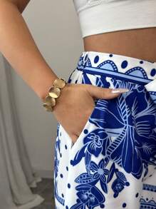 Elenzga Nouveaux pantalons larges à imprimé bleu sur base blanche pour femme, idéal pour les vacances, printemps/été