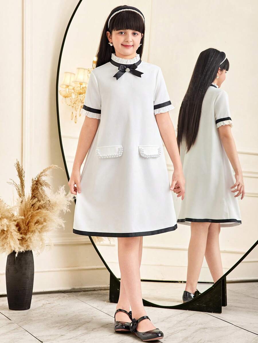 SHEIN 少女休闲优雅褶皱荷叶边拼接撞色蝴蝶结装饰A字短袖连衣裙，适合外出、上学、婚礼、派对、度假、春夏穿着。 - 白色 - 查看 1