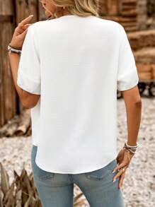 LanaWest Camisa de manga corta con botones, cuello en V profundo y corte holgado