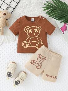 Ensemble de 2 pièces pour bébé garçon, T-shirt à imprimé ours mignon et short blocs de couleurs en tissu nid d'abeille, style casual, matériau doux et confortable, convient pour les vacances, les voyages, l'école, les rassemblements quotidiens, les sports, le printemps/été
