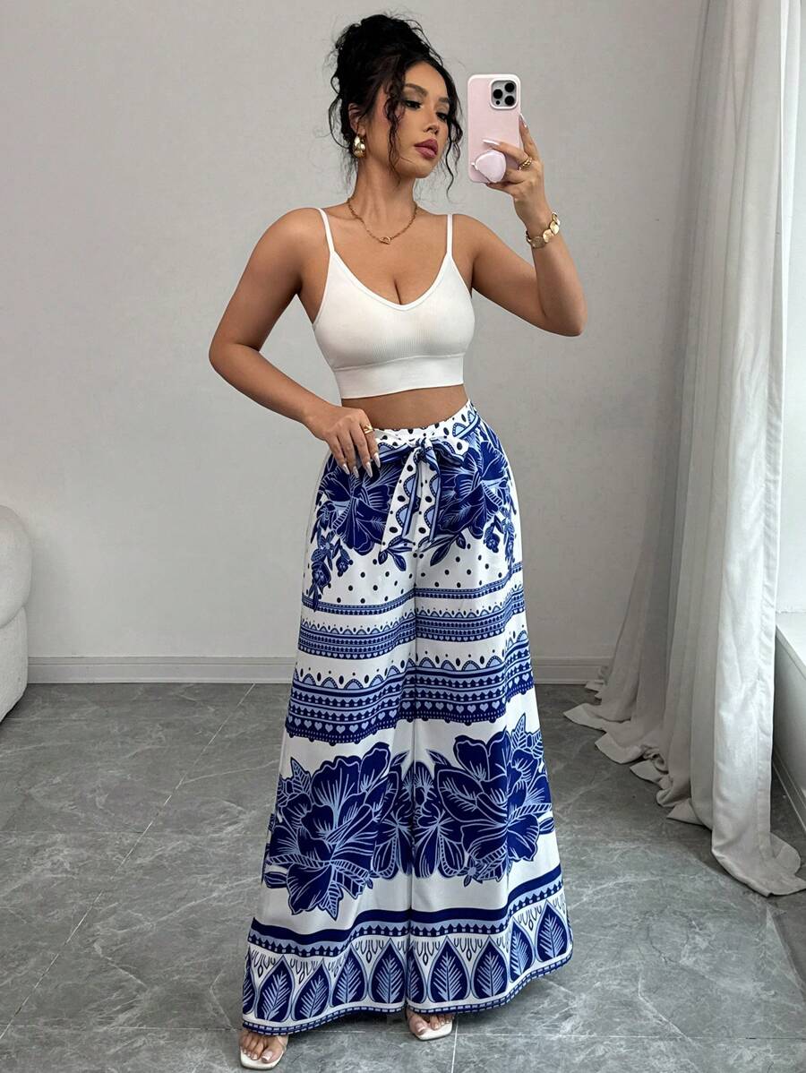 Elenzga Nouveaux pantalons larges à imprimé bleu sur base blanche pour femme, idéal pour les vacances, printemps/été