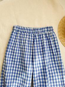 SHEIN LMoss Kids Pantalones casuales holgados de cuadros tejidos para niña joven LMoss