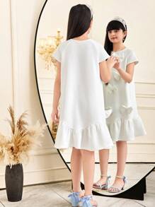 SHEIN Tween Girls Casual Elegant 3D Bow Decor, Pearl Embellished Wavy Hem A-Line Knit Solid Color Short Sleeve Dress