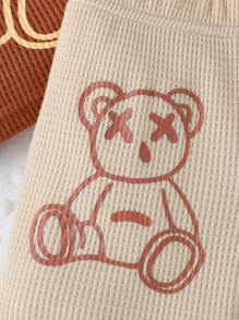 Ensemble de 2 pièces pour bébé garçon, T-shirt à imprimé ours mignon et short blocs de couleurs en tissu nid d'abeille, style casual, matériau doux et confortable, convient pour les vacances, les voyages, l'école, les rassemblements quotidiens, les sports, le printemps/été