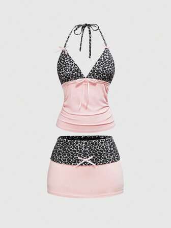 Kawaii Conjunto de 2 piezas de mujer con estampado de leopardo en tonos rosados, decorado con lazo, que incluye top de tirantes finos + falda mini de talle bajo, atuendo de verano