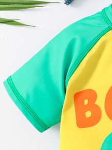 SHEIN Buy 1 Get 1 Free! Buy Swimsuit Get Matching Cap: Young Boys Cute Cartoon Ocean Shark, Skateboard, Coconut Tree, Dinosaur, Letter, Tree, House Colorblock Raglan Sleeve One-Piece Swimsuit + Matching Cap Set. Suitable For Beach, Swimming, Surfing, Vacation, Spring And Summer - Green - View 6