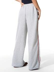 SHEIN Pantalones casuales de chándal para niñas preadolescentes con cintura elástica, a rayas rojas y diseño gráfico de letras, para primavera/verano