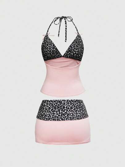 Kawaii Conjunto de 2 piezas de mujer con estampado de leopardo en tonos rosados, decorado con lazo, que incluye top de tirantes finos + falda mini de talle bajo, atuendo de verano