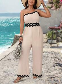SHEIN VCAY Bộ đồ liền thân ống rộng cạp trễ màu đen viền bèo nhún cỡ lớn lãng mạn, thích hợp cho ngày lễ tình nhân, trang phục mùa hè cho phụ nữ, bãi biển, quần áo mùa hè cho phụ nữ, trang phục ngày lễ thánh Patrick, trang phục mùa xuân cho phụ nữ, trang phục cho khách dự tiệc cưới, lãng mạn - Màu be - Xem 5