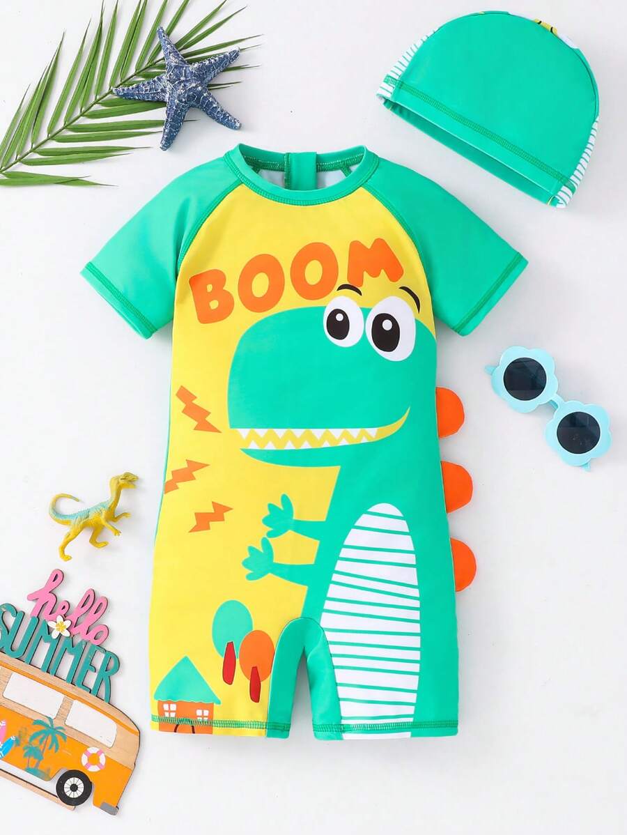 SHEIN Buy 1 Get 1 Free! Buy Swimsuit Get Matching Cap: Young Boys Cute Cartoon Ocean Shark, Skateboard, Coconut Tree, Dinosaur, Letter, Tree, House Colorblock Raglan Sleeve One-Piece Swimsuit + Matching Cap Set. Suitable For Beach, Swimming, Surfing, Vacation, Spring And Summer - Green - View 1