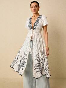 Poéselle Camisa maxi romántica para vacaciones con escote en V profundo, cinturón, flecos y mangas abullonadas cortas con estampado floral para mujer