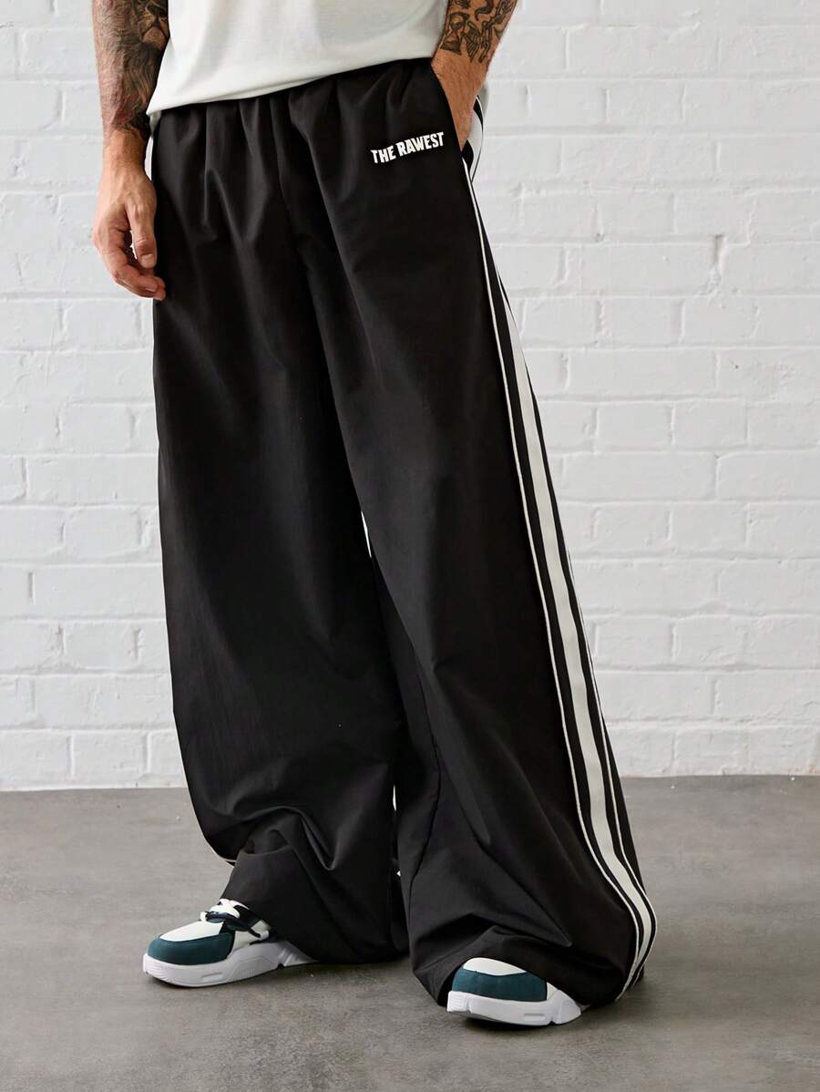 Manfinity VCAY Pantalon ample à taille élastique avec cordon de serrage et imprimé lettres tissé, convient pour la randonnée en extérieur