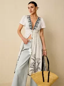 Poéselle Camisa maxi romántica para vacaciones con escote en V profundo, cinturón, flecos y mangas abullonadas cortas con estampado floral para mujer