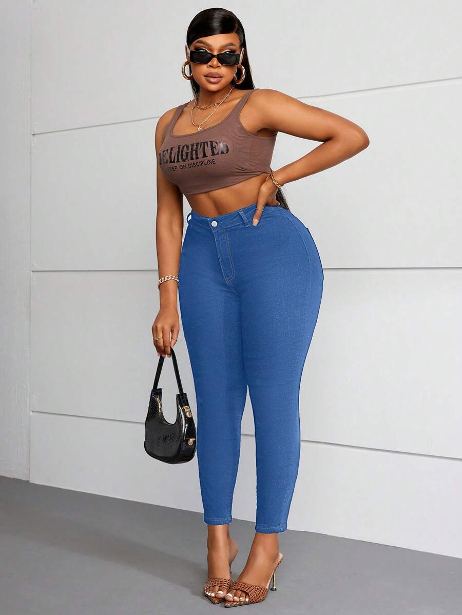 SHEIN Essnce Jeans ajustados de cintura alta casual y desgastados para mujer - Lavado ligero - Ver 1