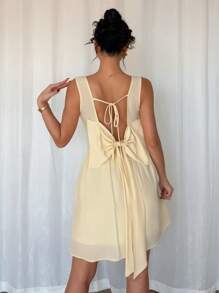 Chiquease Delikatna, urocza i słodka sukienka z odkrytymi plecami i wiązaniem na kokardkę