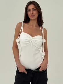 Aloruh Vrouwen Effen Kleur Bloemen Decor Twist Front Bodysuit, Minimalistisch & Slim Fit