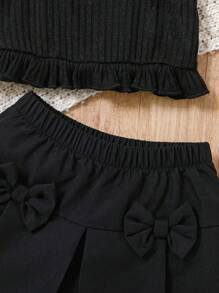 SHEIN 2-częściowy zestaw dla dziewczynek na wiosnę/lato - czarny elegancki minimalistyczny siateczkowy kokardkowy ozdobnik, dzianinowy top na ramiączkach i spódnica z kokardą