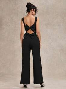 Mono sin mangas con espalda descubierta y lazo decorativo para mujeres, de pierna ancha - Elegante atuendo para salir, citas, fiestas - Mono asimétrico versátil - Negro - Ver 4