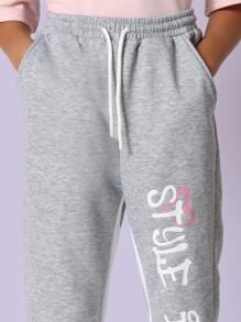 SUMWON Pantalón de chándal deportivo con estampado gráfico lateral, en felpa suave, ropa de estar por casa casual, estilo urbano, con elástico en los tobillos, para jóvenes y adolescentes, escuela, deporte, invierno