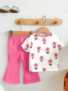 SHEIN Set de 2 piezas de niña joven con camiseta de cuello redondo de manga corta con estampado floral de dibujos animados y pantalones acampanados, apta para el verano - Multicolor - Ver 2