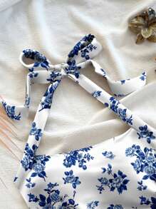 Soleia Parte superior de punto texturizada con lazo en el cuello para mujer talla grande, corte favorecedor, apropiada para verano en estampado floral azul pequeño, vacaciones, primavera/verano