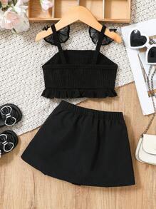 SHEIN 2-częściowy zestaw dla dziewczynek na wiosnę/lato - czarny elegancki minimalistyczny siateczkowy kokardkowy ozdobnik, dzianinowy top na ramiączkach i spódnica z kokardą