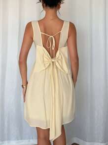 Chiquease Delikatna, urocza i słodka sukienka z odkrytymi plecami i wiązaniem na kokardkę