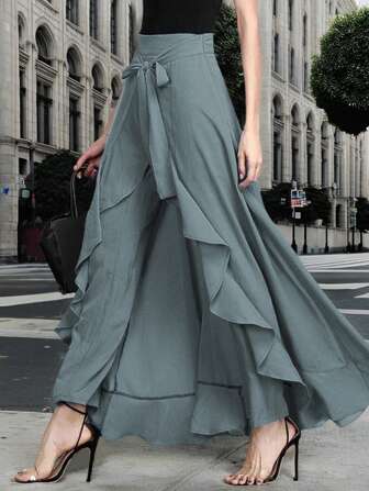 女士春夏休闲腰带开叉荷叶边短裙长裙裤子。