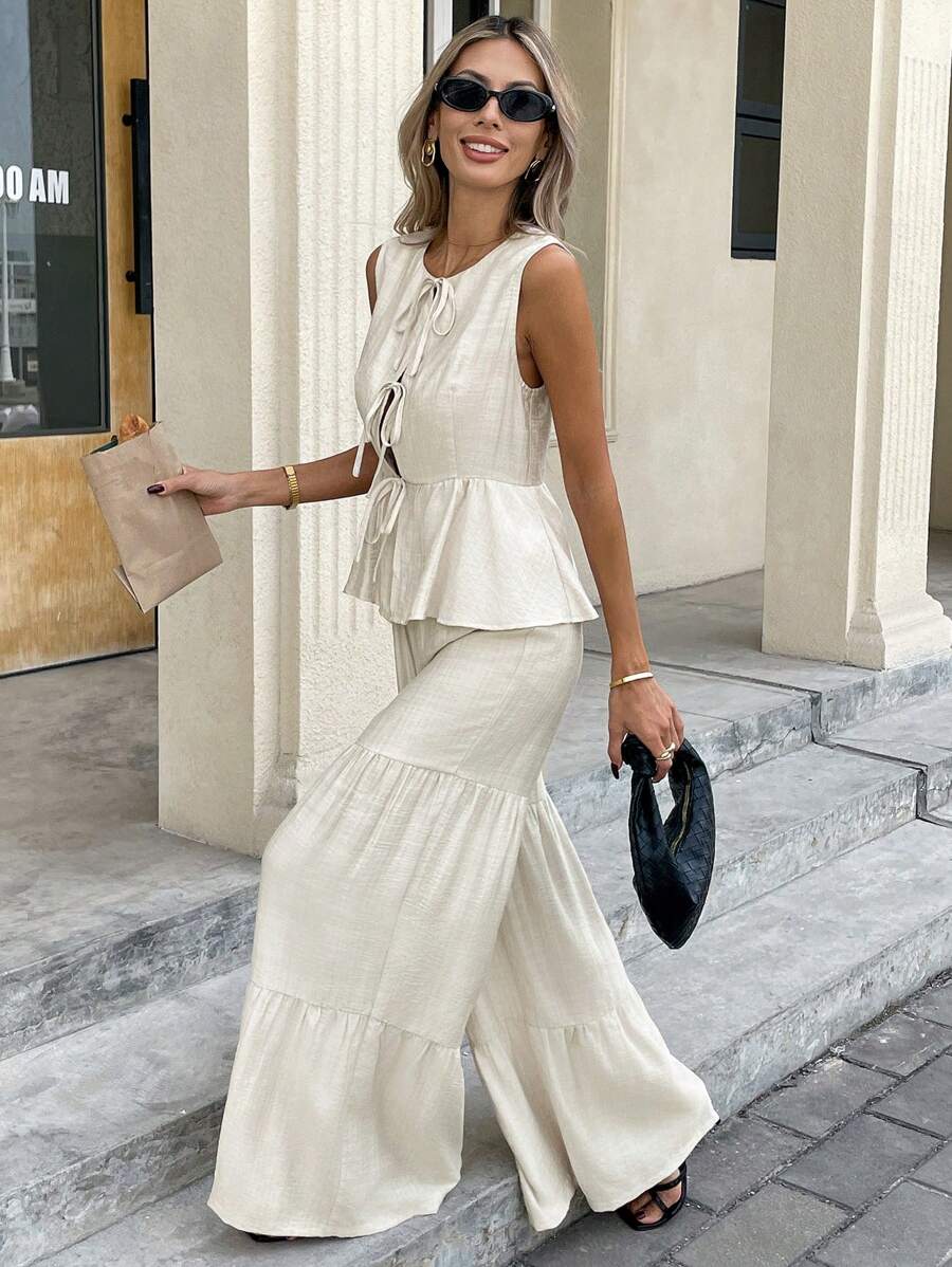 Serisse Bộ 2 quần và áo vest không tay màu trơn cho nữ, trang phục thường ngày thời trang tối giản, bộ hai món áo babydoll không tay và quần ống rộng dài đến gối, nơ cài trước và giữa, vải họa tiết màu trơn, kỳ nghỉ thanh lịch, thích hợp mặc hàng ngày, xuân/hè - Màu be - Xem 1