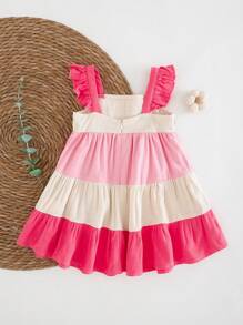 Cozy Pixies Vestido de bebé niña con cintura ceñida, ruedo con volantes, cuello cuadrado y parches de colores contrastantes