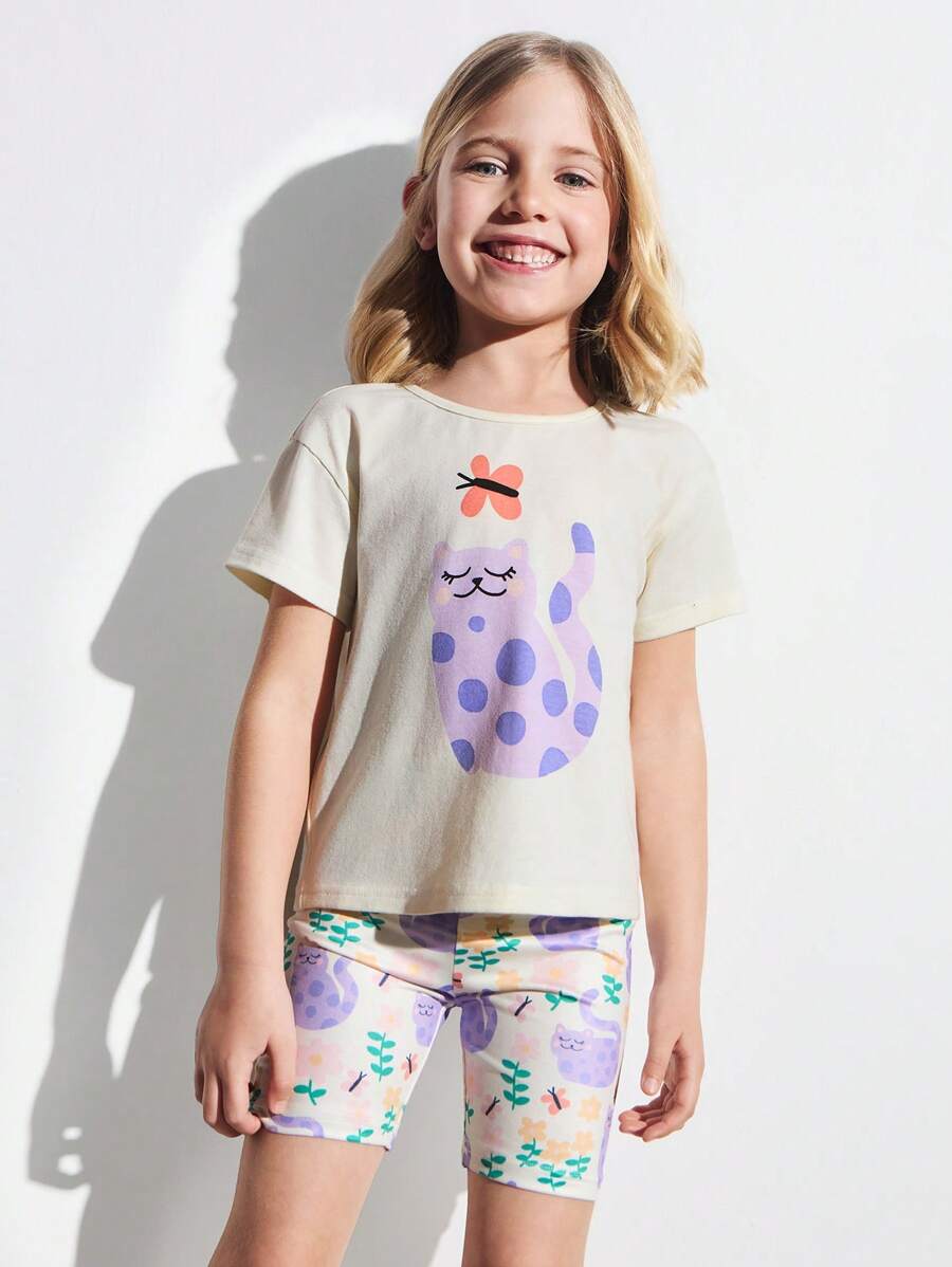 THE HAPPY LOOK Ensemble jeune fille d'un t-shirt ample à imprimé chat avec épaules dénudées et un short à imprimé chat tout-sur, style décontracté et mignon