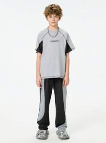 SHEIN Explorewe 1 件男童休闲宽松拼布运动裤，深灰色调展现低调奢华，弧形裤腿设计，双色拼布增添独特性，舒适面料，适合日常穿着、户外、休闲、运动、散步 - 灰色 - 查看 7