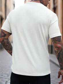 Manfinity Homme Men's Textured White T-Shirt For Casual Summer With V-Neck Short Sleeve Henry Color Block