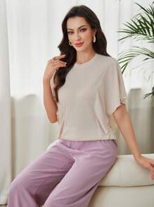 Seusyu Women's Solid Color Round Neck Short Sleeve Simple Casual Ribbed Ruffle Sleeve T-Shirt - Apricot - View 1