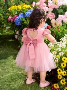 Vestido elegante y lindo de malla rosada con un corazón calado para bebé niña - Rosa - Ver 1