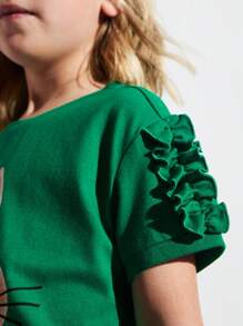 THE HAPPY LOOK Camiseta ajustada con cuello redondo, mangas con volantes y estampado de conejo linda para niñas, estilo adorable de Pascua