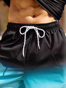 Manfinity Swimmode 2 件男士字母和棕榈树印花插肩袖上衣和短裤泳衣套装男士泳裤，夏威夷风