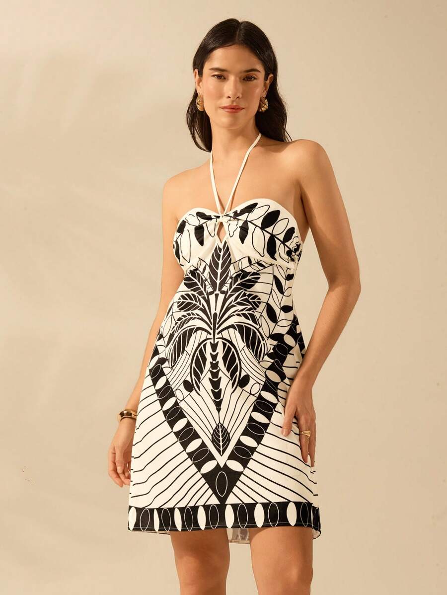 CAJUNI 女士波西米亚风热带黑色植物印花度假休闲夏季海滩挂脖露背迷你连衣裙