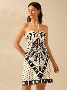 CAJUNI 女士波西米亚风热带黑色植物印花度假休闲夏季海滩挂脖露背迷你连衣裙