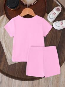 SHEIN Conjunto de 2 piezas de niña bebé, estilo casual, cómodo y minimalista, con estampado de letra de capibara de dibujos animados en la parte superior de cuello redondo de manga corta y pantalones cortos tipo bicicleta, para primavera/verano