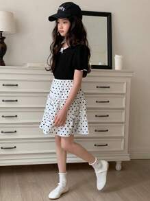 DAZY Conjunto de 2 piezas para niñas preadolescentes con blusa casual con lazo decorativo y falda con estampado de lunares, conjunto de ropa de verano, ropa para volver al colegio - Negro - Ver 2