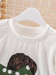 SHEIN Set de 2 piezas: Top con manga corta con volantes con estampado de figura femenina y minifalda plisada con lunares - Verde - Ver 5