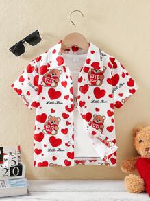 SHEIN Chemise à col et manches courtes et mignonne pour jeune garçon avec imprimé cœur et ours. Fournissant un port confortable pour les garçons pendant la saison estivale - Blanc - Voir 1