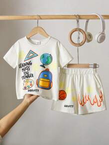 SHEIN مجموعة تي شيرت بأكمام قصيرة وشورت كاجوال بطبعة شعار للأولاد، مناسبة للصيف 2 قطعة/طقم - لون مشمشي - مشاهدة 1