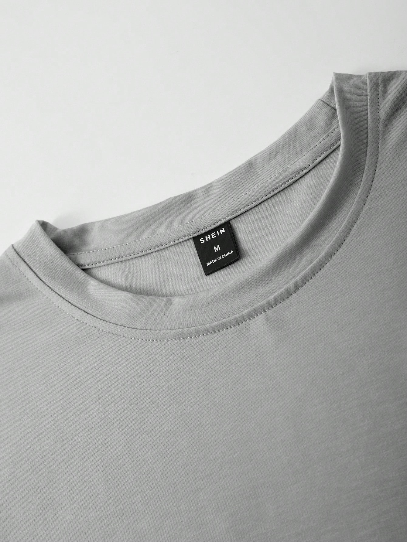 Manfinity Homme تيشيرت كاجوال رجالي بطباعة حرفية ب...