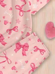 SHEIN Pijama minimalista informal de manga corta y pantalón para niñas preadolescentes, con moño rosa dulce y estampado en inglés, de ajuste ceñido, para primavera y verano