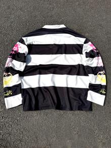 Manfinity EMRG Men's Young Streetwear And Collegiate Sports Style, Featuring A Long-Sleeve Polo Shirt With A High-Street Design In Black And White Stripes And Neon Pink And Yellow Contrasting Text Patterns. The Shirt Has A Button Placket And Is Adorned With A Badge Pattern On The Chest. This Piece Embodies Street Fashion And Y2K Aesthetics, Making It A Stylish Gift Idea For Boyfriends Or Husbands. NEW YORK - Multicolor - View 3