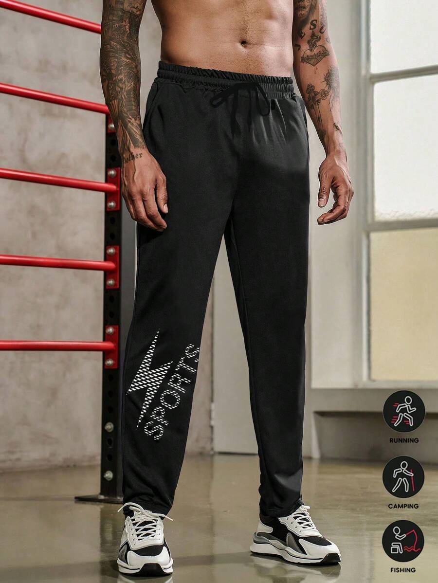 Manfinity Sport Corelite Manfinity New Men's Casual Sports Workout Muscle Fit Elastic Waist Drawstring Pants, Struped Color Contrast.Spring, Suitable For Basketball, Training, Outdoor, Running Sweat Pants - Black - View 1